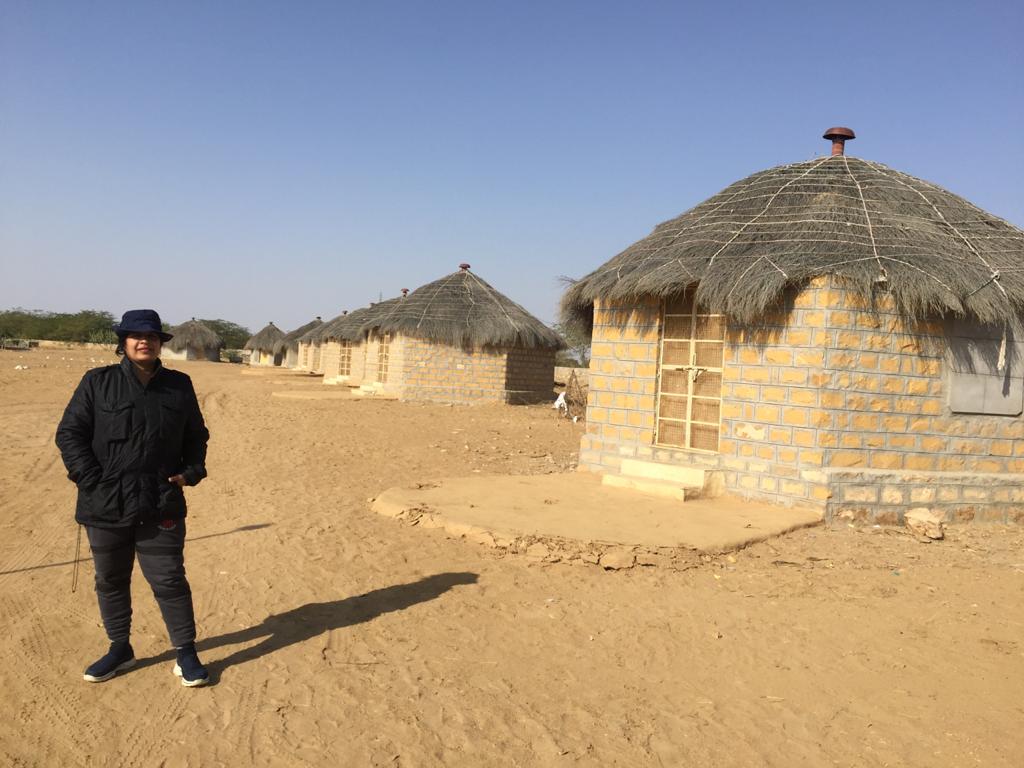 Seema Suresh infront of a mud hut in Desert National Park, Rajasthan